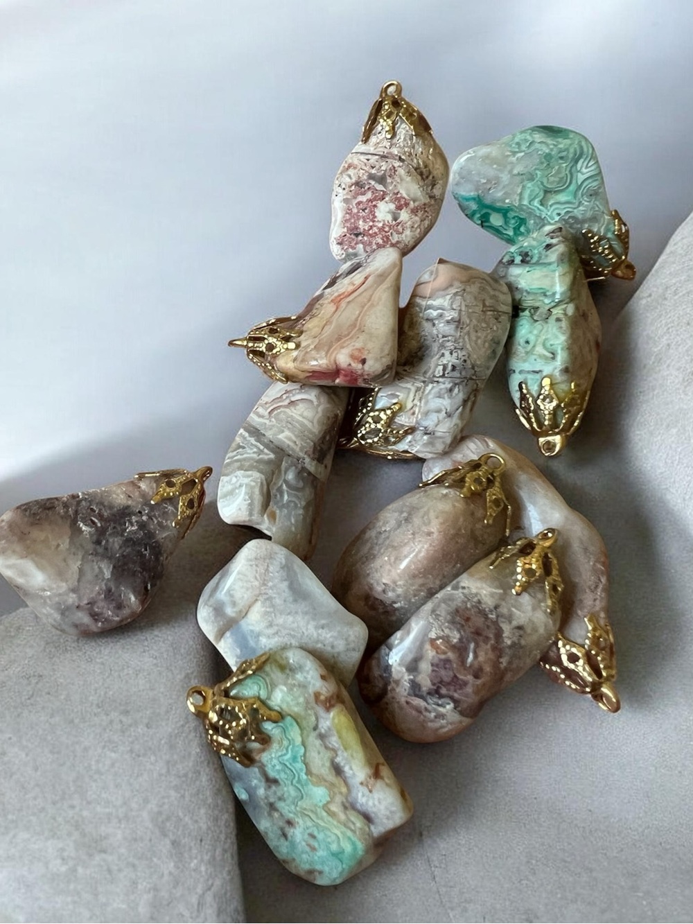 Lot of 12 freeform stone rock polished pendants Ready for a chain Jewelry making